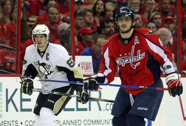WASHINGTON - MAY 13:  Alex Ovechkin #8 of the Washington Capitals skates against Sidney Crosby #87 of the Pittsburgh Penguins during Game Seven of the Eastern Conference Semifinal  Round of the 2009 Stanley Cup Playoffs at Verizon Center on May 13, 2009 in Washington, DC.The Penguins defeated the Capitals 6-2 to move into the semifinals.  (Photo by Bruce Bennett/Getty Images)