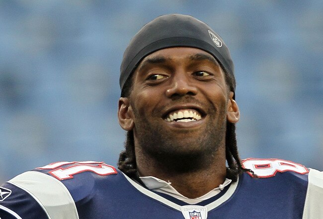 FOXBORO, MA - AUGUST 12: Randy Moss #81 of the New England Patriots holds the football before the preseason game against the New Orleans Saints at Gillette Stadium on August 12, 2010 in Foxboro, Massachusetts. (Photo by Jim Rogash/Getty Images)