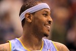 SALT LAKE CITY - APRIL 30:  Carmelo Anthony #15 of the Denver Nuggets stands on the court during their game against the Utah Jazz in Game Six of the Western Conference Quarterfinals of the 2010 NBA Playoffs at EnergySolutions Arena on April 30, 2010 in Salt Lake City, Utah. NOTE TO USER: User expressly acknowledges and agrees that, by downloading and or using this photograph, User is consenting to the terms and conditions of the Getty Images License Agreement.  (Photo by Ezra Shaw/Getty Images)
