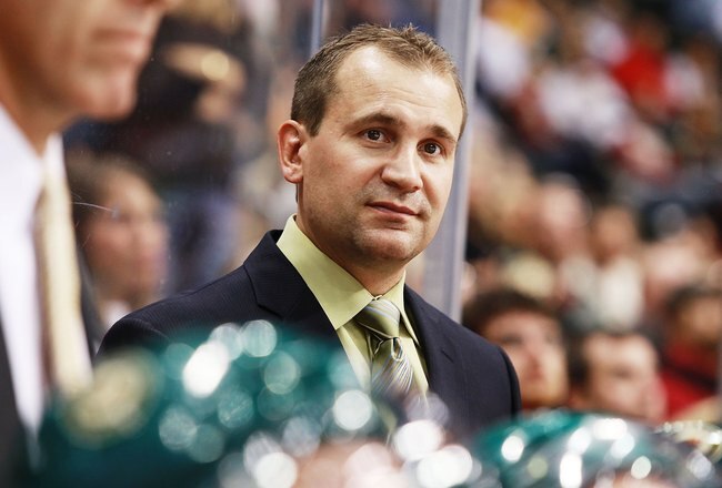 ST. PAUL, MN - SEPTEMBER 24: Todd Richards, head coach of the Minnesota Wild, looks on during their preseason game against the St. Louis Blues at the Xcel Energy Center on September 24, 2009 in St. Paul, Minnesota.  (Photo by Genevieve Ross/Getty Images)