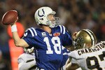 MIAMI GARDENS, FL - FEBRUARY 07: Peyton Manning #18 of the Indianapolis Colts looks to pass against the New Orleans Saints during Super Bowl XLIV on February 7, 2010 at Sun Life Stadium in Miami Gardens, Florida.  (Photo by Andy Lyons/Getty Images)