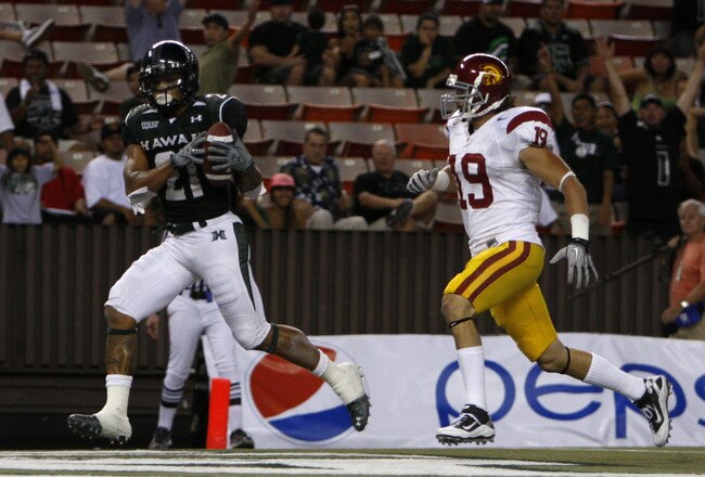 HONOLULU - SEPTEMBER 2:  Kealoha Pilares of the University of Hawaii Warriors  scores a touchdown during secondhalf action at Aloha Stadium September 2, 2010 in Honolulu, Hawaii. (Photo by Kent Nishimura/Getty Images)