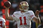 OAKLAND, CA - AUGUST 28:  Alex Smith #11 of the San Francisco 49ers passes against the Oakland Raiders during an NFL preseason game at Oakland-Alameda County Coliseum on August 28, 2010 in Oakland, California.  (Photo by Jed Jacobsohn/Getty Images)