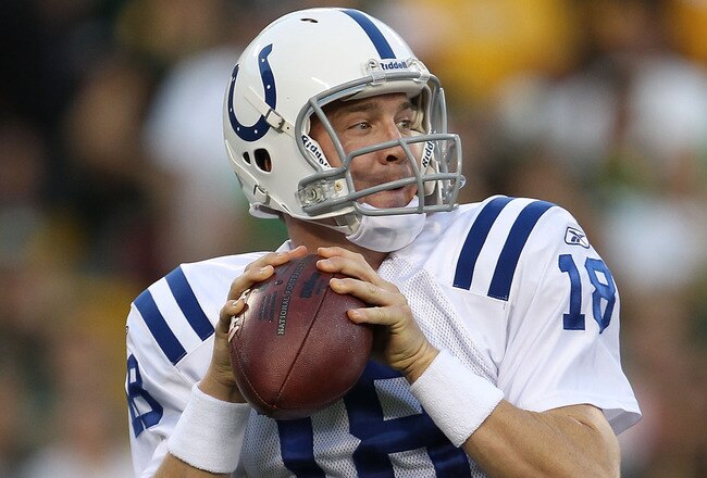 GREEN BAY, WI - AUGUST 26: Peyton Manning #18 of the Indianapolis Colts looks for a receiver against the Green Bay Packers during a preseason game at Lambeau Field on August 26, 2010 in Green Bay, Wisconsin.  The Packers defeated the Colts 59-24. (Photo by Jonathan Daniel/Getty Images)