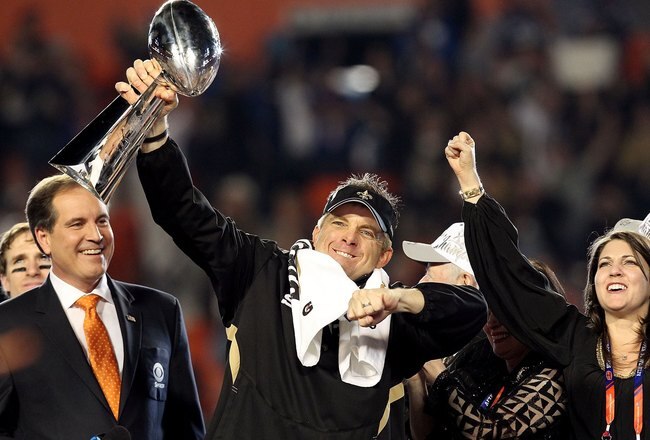 MIAMI GARDENS, FL - FEBRUARY 07:  Head coach Sean Payton of the New Orleans Saints celebrates with the Vince Lombardi Trophy after his team defeated the Indianapolis Colts during Super Bowl XLIV on February 7, 2010 at Sun Life Stadium in Miami Gardens, Florida.  (Photo by Ronald Martinez/Getty Images)