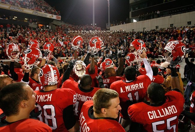 ATLANTA - NOVEMBER 28:  The Georgia Bulldogs celebrate their 30-24 win over the Georgia Tech Yellow Jackets at Bobby Dodd Stadium on November 28, 2009 in Atlanta, Georgia.  (Photo by Kevin C. Cox/Getty Images)