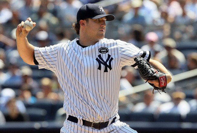 NEW YORK - AUGUST 19:  Phil Hughes #65 of the New York Yankees delivers a pitch against the Detroit Tigers on August 19, 2010 at Yankee Stadium in the Bronx borough of New York City.  (Photo by Jim McIsaac/Getty Images)