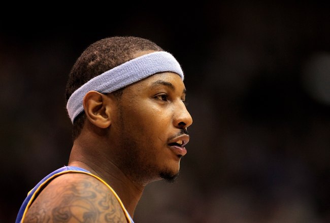SALT LAKE CITY - APRIL 30:  Carmelo Anthony #15 of the Denver Nuggets stands on the court during their game against the Utah Jazz in Game Six of the Western Conference Quarterfinals of the 2010 NBA Playoffs at EnergySolutions Arena on April 30, 2010 in Salt Lake City, Utah. NOTE TO USER: User expressly acknowledges and agrees that, by downloading and or using this photograph, User is consenting to the terms and conditions of the Getty Images License Agreement.  (Photo by Ezra Shaw/Getty Images)