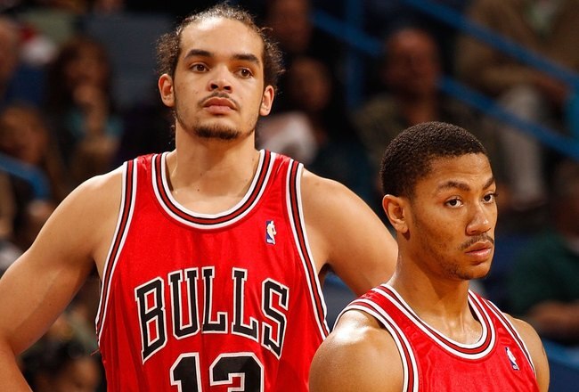 NEW ORLEANS - JANUARY 29:  Joakim Noah #13 and Derrick Rose #1 of the Chicago Bulls during the game against the New Orleans Hornets at the New Orleans Arena on January 29, 2010 in New Orleans, Louisiana.   NOTE TO USER: User expressly acknowledges and agrees that, by downloading and/or using this Photograph, User is consenting to the terms and conditions of the Getty Images License Agreement.  (Photo by Chris Graythen/Getty Images)