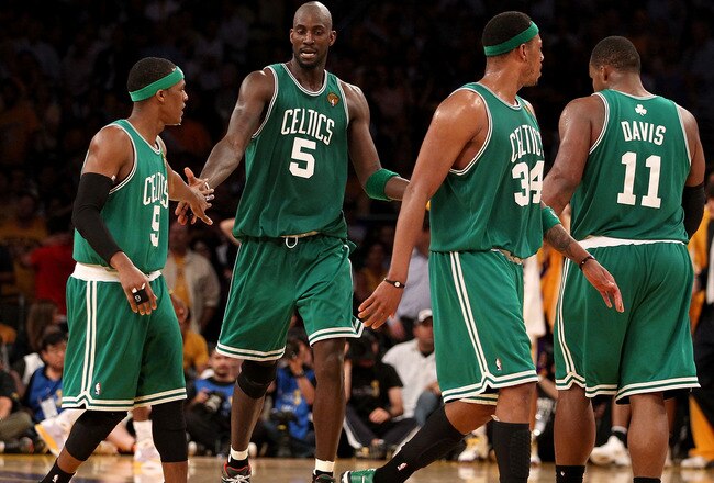 LOS ANGELES, CA - JUNE 17:  (L-R) Rajon Rondo #9, Kevin Garnett #5, Paul Pierce #34 and Glen Davis #11 of the Boston Celtics walk across the court in the second half against the Los Angeles Lakers in Game Seven of the 2010 NBA Finals at Staples Center on June 17, 2010 in Los Angeles, California.  NOTE TO USER: User expressly acknowledges and agrees that, by downloading and/or using this Photograph, user is consenting to the terms and conditions of the Getty Images License Agreement.  (Photo by Christian Petersen/Getty Images)