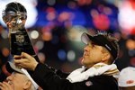MIAMI GARDENS, FL - FEBRUARY 07:  Head coach Sean Payton of the New Orleans Saints celebrates with the Vince Lombardi Trophy after his team defeated the Indianapolis Colts during Super Bowl XLIV on February 7, 2010 at Sun Life Stadium in Miami Gardens, Florida.  (Photo by Jonathan Daniel/Getty Images)