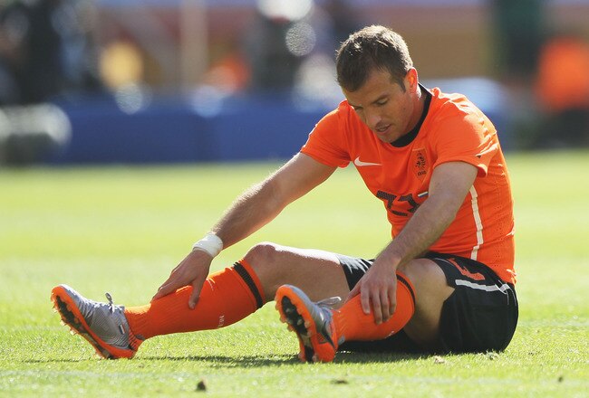 JOHANNESBURG, SOUTH AFRICA - JUNE 14: Rafael Van der Vaart of the Netherlands sits on the ground during the 2010 FIFA World Cup Group E match between Netherlands and Denmark at Soccer City Stadium on June 14, 2010 in Johannesburg, South Africa.  (Photo by Christof Koepsel/Getty Images)