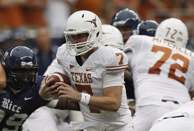 HOUSTON - SEPTEMBER 04:  Quarterback Garrett Gilbert #7 of the Texas Longhorns during game action against the Rice Owls at Reliant Stadium on September 4, 2010 in Houston, Texas. Texas won 34-17.  (Photo by Bob Levey/Getty Images)