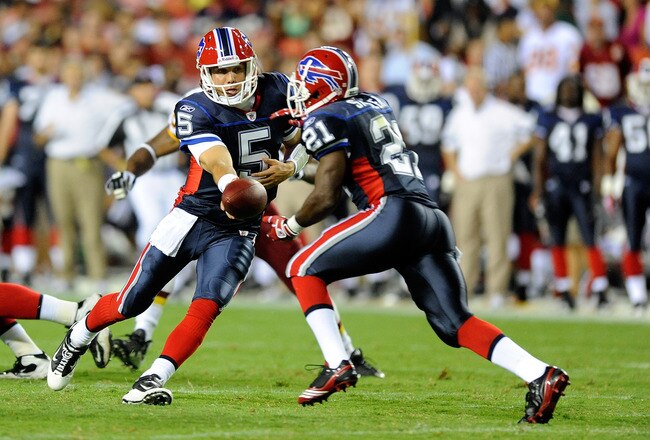 LANDOVER, MD - AUGUST 13:  Trent Edwards #5 of the Buffalo Bills hands the ball off to C.J. Spiller #21 during the preseason game against the Washington Redskins at FedEx Field on August 13, 2010 in Landover, Maryland.  (Photo by Greg Fiume/Getty Images)
