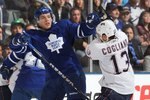 TORONTO, ON - MARCH 13:  Nikolai Kulemin #41 of the Toronto Maple Leafs collides with Andrew Cogliano #13 of  the Edmonton Oilers in a game on March 13, 2010 at the Air Canada Centre in Toronto, Ontario. The Leafs defeated the Oilers 6-4. (Photo by Claus Andersen/Getty Images)