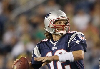 FOXBORO, MA - AUGUST 26: Tom Brady #12 of the New England Patriots looks to pass in the second half against the St. Louis Rams on August 26, 2010 at Gillette Stadium in Foxboro, Massachusetts. The Rams defeated the Patriots 36-35. (Photo by Elsa/Getty Images)