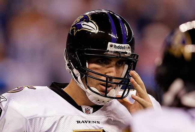 INDIANAPOLIS - JANUARY 16:  Quarterback Joe Flacco #5 of the Baltimore Ravens huddles with teammates against the Indianapolis Colts in the AFC Divisional Playoff Game at Lucas Oli Stadium on January 16, 2010 in Indianapolis, Indiana.  (Photo by Jonathan Daniel/Getty Images)