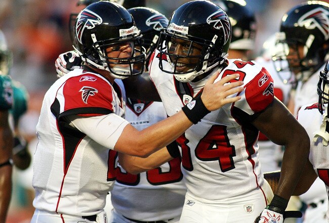 MIAMI - AUGUST 27:  Quarterback Matt Ryan #2  (L) and wide reciever Roddy White #84 (C) of the Atlanta Falcons celebrate a touchdown catch by White against the Miami Dolphins during their preseason game at Sun Life Stadium on August 27, 2010 in Miami, Florida.  (Photo by Marc Serota/Getty Images)