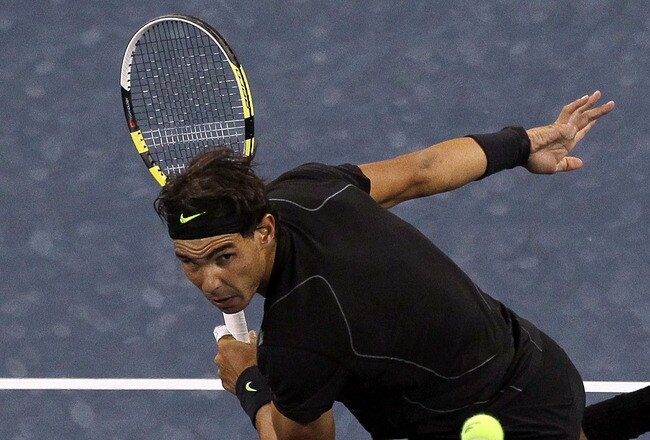 NEW YORK - SEPTEMBER 09:  Rafael Nadal of Spain returns a shot against Fernando Verdasco of Spain during his men's single quarterfinal match on day eleven of the 2010 U.S. Open at the USTA Billie Jean King National Tennis Center on September 9, 2010 in the Flushing neighborhood of the Queens borough of New York City.  (Photo by Jim McIsaac/Getty Images)