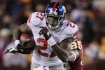 LANDOVER, MD - DECEMBER 21:  Brandon Jacobs #27 of the New York Giants in action against  the Washington Redskinsduring their game on December 21, 2009 at Fedex Field in Landover, Maryland.  (Photo by Al Bello/Getty Images)