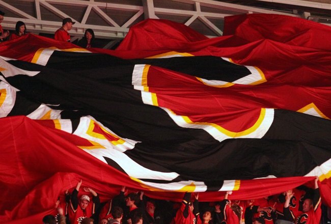 CALGARY, AB - APRIL 20: A giant Calgary Flames flag is passed through the crowd before the game against the Chicago Blackhawks in Game Three of the Western Conference Quarterfinals of the 2009 Stanley Cup Playoffs on April 20, 2009 at the Pengrowth Saddledome in Calgary, Alberta, Canada. (Photo by Mike Ridewood/Getty Images)