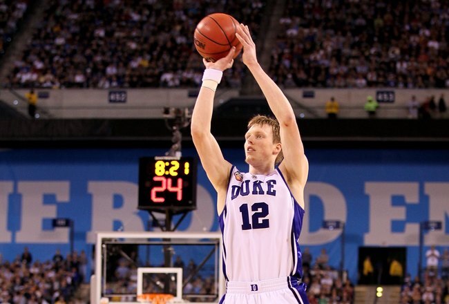 INDIANAPOLIS - APRIL 05:  Kyle Singler #12 of the Duke Blue Devils attempts a shot against the Butler Bulldogs during the 2010 NCAA Division I Men's Basketball National Championship game at Lucas Oil Stadium on April 5, 2010 in Indianapolis, Indiana. Duke won 61-59.  (Photo by Andy Lyons/Getty Images)