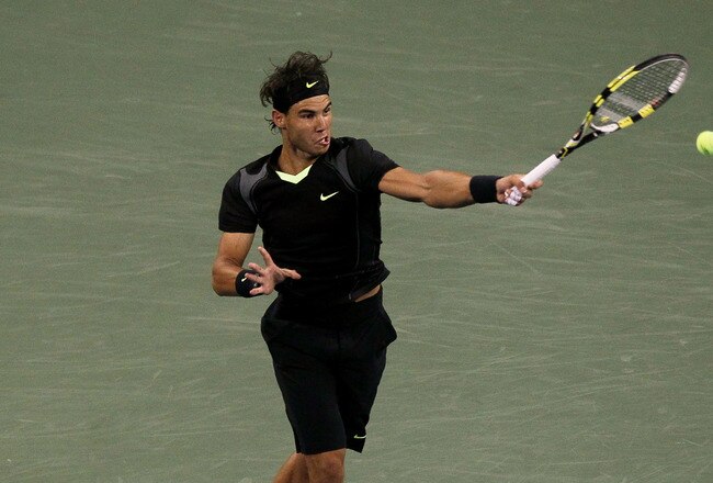 NEW YORK - SEPTEMBER 09:  Rafael Nadal of Spain returns a shot against Fernando Verdasco of Spain during his men's single quarterfinal match on day eleven of the 2010 U.S. Open at the USTA Billie Jean King National Tennis Center on September 9, 2010 in the Flushing neighborhood of the Queens borough of New York City.  (Photo by Jim McIsaac/Getty Images)
