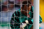 BLACKBURN, ENGLAND - AUGUST 28:  Manuel Almunia of Arsenal inspects the broken net during the Barclays Premier League match between Blackburn Rovers and Arsenal at Ewood Park on August 28, 2010 in Blackburn, England. (Photo by Alex Livesey/Getty Images)