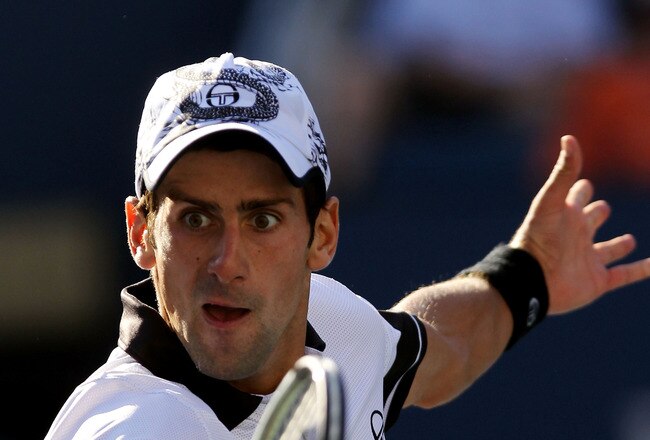 NEW YORK - SEPTEMBER 08:  Novak Djokovic of Serbia hits a return against Gael Monfils of France during his men's singles quarterfinal match on day ten of the 2010 U.S. Open at the USTA Billie Jean King National Tennis Center on September 8, 2010 in the Flushing neighborhood of the Queens borough of New York City.  (Photo by Nick Laham/Getty Images)