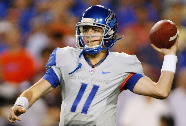 LANDOVER, MD - SEPTEMBER 06:  Quarterback Kellen Moore #11 of the Boise State Broncos passes against the Virginia Tech Hokies at FedExField on September 6, 2010 in Landover, Maryland.  (Photo by Geoff Burke/Getty Images)