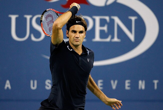 NEW YORK - SEPTEMBER 06:  Roger Federer of Switzerland follows through on a return against Jurgen Melzer of Austria during day eight of the 2010 U.S. Open at the USTA Billie Jean King National Tennis Center on September 6, 2010 in the Flushing neighborhood of the Queens borough of New York City.  (Photo by Matthew Stockman/Getty Images)