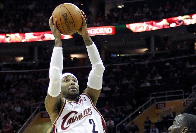 CLEVELAND - MAY 01:  Mo Williams #2 of the Cleveland Cavaliers gets a shot off over Kendrick Perkins #43 of the Boston Celtics during Game One of the Eastern Conference Semifinals during the 2010 NBA Playoffs at Quicken Loans Arena on May 1, 2010 in Cleveland, Ohio. Cleveland won the game 101-93. NOTE TO USER: User expressly acknowledges and agrees that, by downloading and or using this photograph, User is consenting to the terms and conditions of the Getty Images License Agreement.  (Photo by Gregory Shamus/Getty Images)