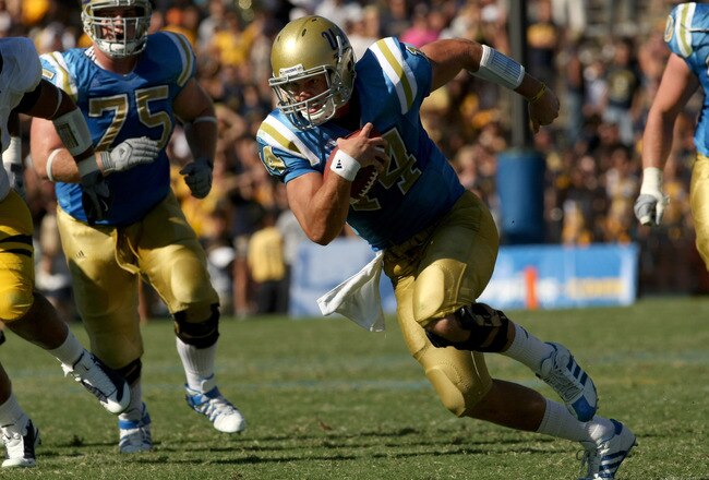 PASADENA, CA - OCTOBER 17:  Quarterback Kevin Prince #14 of the UCLA Bruins runs with the ball against the California Golden Bears on October 17, 2009 at the Rose Bowl in Pasadena, California.   Cal won 45-26.  (Photo by Stephen Dunn/Getty Images)