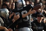 OAKLAND, CA - AUGUST 28:  Michael Bush #29 of the Oakland Raiders celebrates after scoring a touchdown against the San Francisco 49ers during an NFL preseason game at Oakland-Alameda County Coliseum on August 28, 2010 in Oakland, California. (Photo by Jed Jacobsohn/Getty Images)