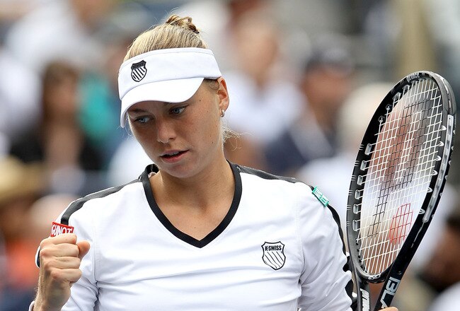 NEW YORK - SEPTEMBER 10:  Vera Zvonareva of Russia reacts after a point played against Caroline Wozniacki of Denmark during her women's semifinal against day twelve of the 2010 U.S. Open at the USTA Billie Jean King National Tennis Center on September 10, 2010 in the Flushing neighborhood of the Queens borough of New York City.  (Photo by Matthew Stockman/Getty Images)