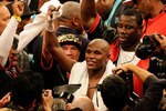 LAS VEGAS - MAY 01:  Floyd Mayweather Jr. reacts after defeating Shane Mosley by unanimous decision after the welterweight fight at the MGM Grand Garden Arena on May 1, 2010 in Las Vegas, Nevada.  (Photo by Ethan Miller/Getty Images)