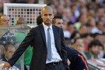 SANTANDER, SPAIN - AUGUST 29:  Barcelona manager Josep Guardiola watches his team play Racing Santander the La Liga match between Racing Santander and Barcelona at El Sardinero stadium on August 29, 2010 in Santander, Spain.  (Photo by Denis Doyle/Getty Images)