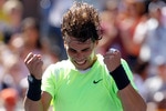 NEW YORK - SEPTEMBER 11:  Rafael Nadal of Spain celebrates defeating Mikhail Youzhny of Russia during his men's singles semifinal match on day thirteen of the 2010 U.S. Open at the USTA Billie Jean King National Tennis Center on September 11, 2010 in the Flushing neighborhood of the Queens borough of New York City.  (Photo by Matthew Stockman/Getty Images)