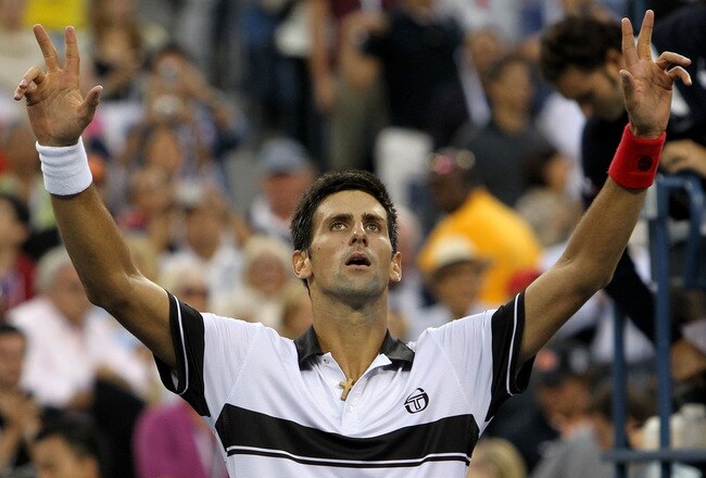 NEW YORK - SEPTEMBER 11:  Novak Djokovic of Serbia celebrates defeating Roger Federer of Switzerland to win his men's singles semifinal match on day thirteen of the 2010 U.S. Open at the USTA Billie Jean King National Tennis Center on September 11, 2010 in the Flushing neighborhood of the Queens borough of New York City.  (Photo by Nick Laham/Getty Images)