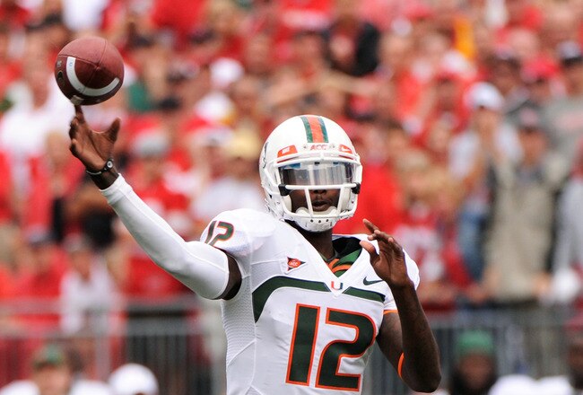 COLUMBUS, OH - SEPTEMBER 11:  Quarterback Jacory Harris #12 of the Miami Hurricanes attempts a pass against the Ohio State Buckeyes at Ohio Stadium on September 11, 2010 in Columbus, Ohio.  (Photo by Jamie Sabau/Getty Images)