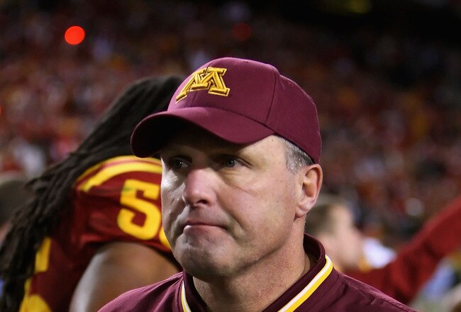 TEMPE, AZ - DECEMBER 31:  Head coach Tim Brewster of the Minnesota Golden Gophers walks off the field after being defeated by the Iowa State Cyclones in the Insight Bowl at Arizona Stadium on December 31, 2009 in Tempe, Arizona. The Cyclones defeated the Golden Gophers 14-13.  (Photo by Christian Petersen/Getty Images)