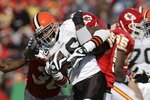 KANSAS CITY, MO - DECEMBER 20:  Joshua Cribbs #16 of the Cleveland Browns struggles for extra yardage during their NFL game against the Kansas City Chiefs on December 20, 2009 at Arrowhead Stadium in Kansas City, Missouri. The Browns defeated the Chiefs 41-34. (Photo by Jamie Squire/Getty Images)