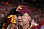 TEMPE, AZ - DECEMBER 31:  Head coach Tim Brewster of the Minnesota Golden Gophers walks off the field after being defeated by the Iowa State Cyclones in the Insight Bowl at Arizona Stadium on December 31, 2009 in Tempe, Arizona. The Cyclones defeated the Golden Gophers 14-13.  (Photo by Christian Petersen/Getty Images)