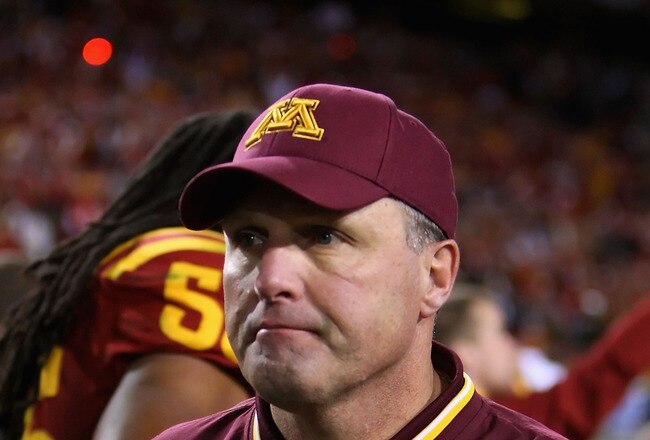 TEMPE, AZ - DECEMBER 31:  Head coach Tim Brewster of the Minnesota Golden Gophers walks off the field after being defeated by the Iowa State Cyclones in the Insight Bowl at Arizona Stadium on December 31, 2009 in Tempe, Arizona. The Cyclones defeated the Golden Gophers 14-13.  (Photo by Christian Petersen/Getty Images)