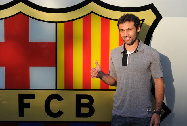 BARCELONA, SPAIN - AUGUST 30:  New signing Javier Mascherano smiles during his presentation as new Barcelona player at the Camp Nou stadium on August 30, 2010 in Barcelona, Spain.  (Photo by Jasper Juinen/Getty Images)
