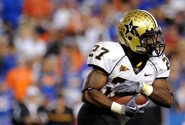 GAINESVILLE, FL - NOVEMBER 7: Running back Warren Norman #27 of the Vanderbilt Commodores rushes upfield against the Florida Gators on November 7, 2009 at Ben Hill Griffin Stadium in Gainesville, Florida.  (Photo by Al Messerschmidt/Getty Images)