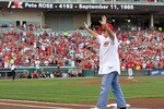 CINCINNATI - SEPTEMBER 11:  Pete Rose waves to the crowd during the ceremony celebrating the 25th anniversary of his breaking the career hit record of 4,192 on September 11, 2010 at Great American Ball Park in Cincinnati, Ohio. He was honored before the start of the game between the Pittsburgh Pirates and the Cincinnati Reds.  (Photo by Andy Lyons/Getty Images)