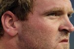 FOXBORO, MA - SEPTEMBER 03:  Logan Mankins #70 of the New England Patriots looks on before the game against the New York Giants on September 3, 2009 at Gillette Stadium in Foxboro, Massachusetts.  (Photo by Elsa/Getty Images)