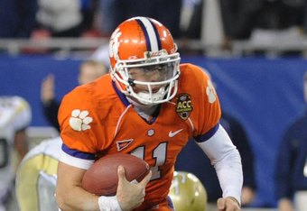 TAMPA, FL - NOVEMBER 28: Quarterback Kyle Parker #11 of the Clemson Tigers rushes upfield against the Georgia Tech Yellow Jackets in the 2009 ACC Football Championship Game December 5, 2009 at Raymond James Stadium in Tampa, Florida.  (Photo by Al Messerschmidt/Getty Images)