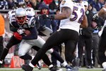 FOXBORO, MA - JANUARY 10:  Randy Moss #81 of the New England Patriots attempts to run for yards after the catch against Chris Carr #25, Dominique Foxworthy #24 and Ray Lewis #52 of the Baltimore Ravens during the 2010 AFC wild-card playoff game at Gillette Stadium on January 10, 2010 in Foxboro, Massachusetts.  (Photo by Jim Rogash/Getty Images)
